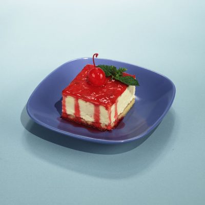 Rich, creamy new York style cheesecake topped with a cherry glaze.